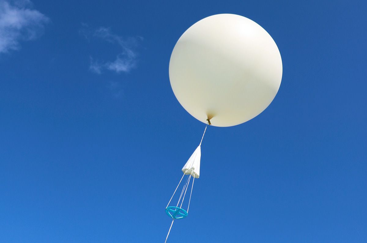 Fig. 7—Weather balloon with parachute just beneath (Courtesy of Intermet).